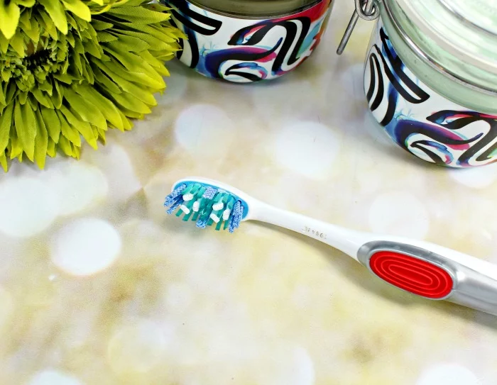 Colgate® Optic White® Toothbrush + Whitening Pen Brush